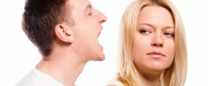 Man screaming at his girlfriend over white background